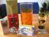 WW-Trinkglaswichtelgeschenk, soo sch&ouml;n: Glas mit orangef.Muster, eine Packung Fr&uuml;chtetee Amaretto-Kirsch, Wildrose Pflegebad, Teesieb,Kerze, Motivations-Schutzengel-Karte.DANKEEEEE