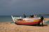 Kleines buntes Fischerboot am Strand von Arma&ccedil;&atilde;o de P&ecirc;ra