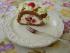 Himbeer - Schokorolle mit Mandelbl�ttchen   ( das St�ck  )