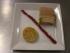 Amouse bouche - Schichttorte von Stopfleber und Kalbsr?cken an Apfelpunschgelee und R?benkrautbrioche.JPG