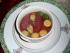 Tomatenessenz mit Basilikumnockerln und Parmesankl�sschen
