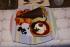 Dessert:  1. Limettenmousse auf Himbeerspiegel in einem Geb�ckk�rbchen   2. Grandmarnier-Parfait auf Gew�rzorangen