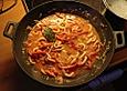 Tintenfische mit Tomaten