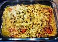 Seelachsfilet mit Tomaten, Zwiebeln, Gew&uuml;rzgurken und K&auml;se &uuml;berbacken