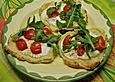 Feurige Kartoffelpizzen mit Fetacreme und Rucola