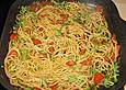Pasta aglio olio mit Rucola und Tomaten