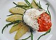 Ged&uuml;nstete Schellfischkotelettes auf karamellisierter Chayote