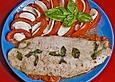 Fisch auf dem Tomatenbett