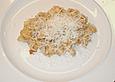 Speck - Birnen - Risotto mit Parmesanhaube