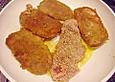 Panierte Schnitzel mit Gorgonzolasauce