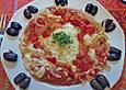 Feta (Schafsk&auml;se) auf Tomaten und Zwiebeln, in der Pfanne gebacken