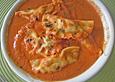 Lachsgef&uuml;llte Ravioli in Tomatensahneso&szlig;e