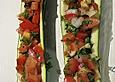 &Uuml;berbackene Zucchini mit Mozzarella an Reis