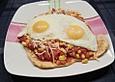 Mexikanische Spiegeleier auf Mais - Tortillas