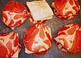 Filets vom schwarzen Heilbutt im Coppamantel mit schwarzer Tagliatelle und Sauce von gelber Paprika
