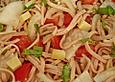 Scharfer Tomatensalat mit Fleischwurst