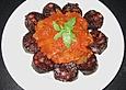Morcilla mit Tomaten und Knoblauch