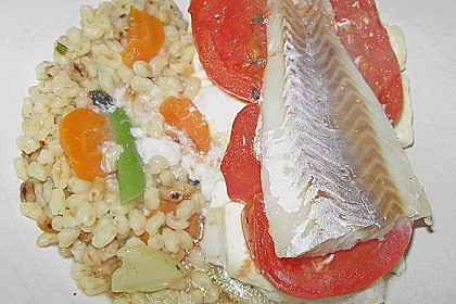 Gefangener Fisch im Backpapier 1