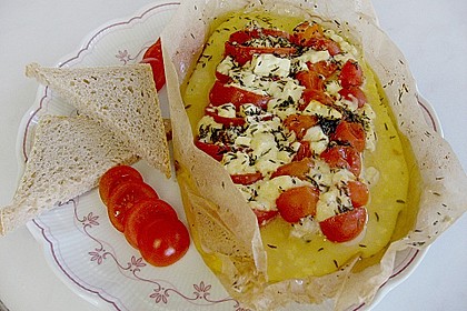 Gefangener Fisch im Backpapier 10