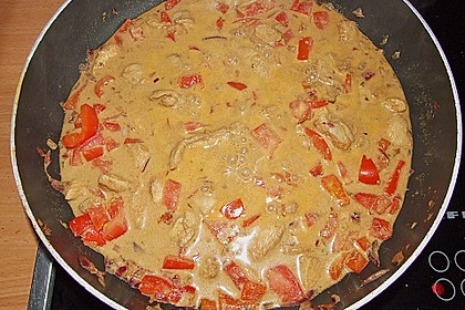 Hähnchen mit Reis 65