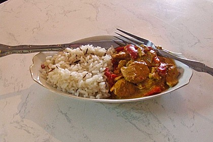 Hähnchen mit Reis 75
