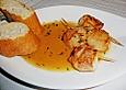 Jakobsmuscheln gebraten und mit lardo umh&uuml;llt