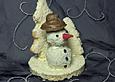 Schneemann im Winterwald