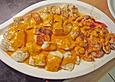 Ragout von dreierlei Fischen mit Garnelen