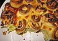&Uuml;berbackene Kartoffelschnecken mit Speckf&uuml;llung