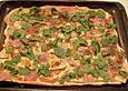 Pizza mit Ziegenk&auml;se, Rucola und Schinken