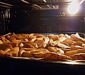 Country - Potatoes oder w&uuml;rzige Kartoffelspalten aus dem Ofen (Bild)