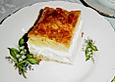 Bienenstich mit Pudding und Sahne