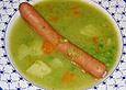 Gr&uuml;ne Erbsensuppe mit Bockwurst
