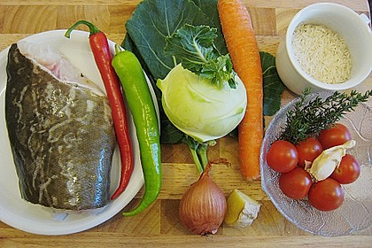 Skreitranche auf der Haut gebraten mit Schmortomaten  auf Ingwer - Gem&uuml;se - Reis