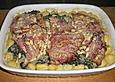 Putensteaks aus dem Ofen mit Spinat - Gorgonzola - Sauce und Pinienkernen