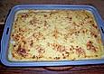 Mit K&auml;se &uuml;berbackene Kartoffeln und Schinken