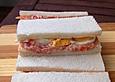 Tramezzini mit Tomaten und Schinken