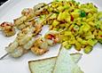 Knoblauch - Chili - Garnelen auf Mango - Koriander - Rohkost