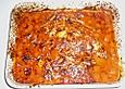 &Uuml;berbackene Fischfilets in einer Kr&auml;uter - Tomatenso&szlig;e