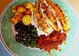 Pangasius auf Spinat und Tomaten