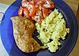 H&auml;hnchenschenkel auf Curry - Champignon - Reis