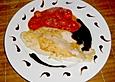 In Zitronen&ouml;l gebratenes Pangasiusfilet mit geschwenkten Tomaten an Balsamicosauce