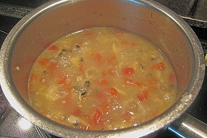 Duett von Venusmuscheln und Garnele in Kapernsauce auf Tonnarelli mit Sepiatinte 2