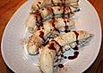 Verlockende Bananenh&auml;lften mit Milchreis und Schokosauce