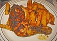 Feurige H&auml;hnchenschenkel - Kartoffelpfanne