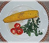 Maiskolben mit Butter (Bild)