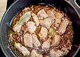 Putenbrustfilet mit Speck und Zwiebeln