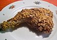 H&auml;hnchenschenkel, knusprig scharf paniert