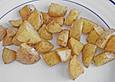 Scharfe Kartoffelw&uuml;rfel vom Blech