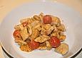 H&auml;hnchengeschnetzeltes mit Champignons und Tomaten